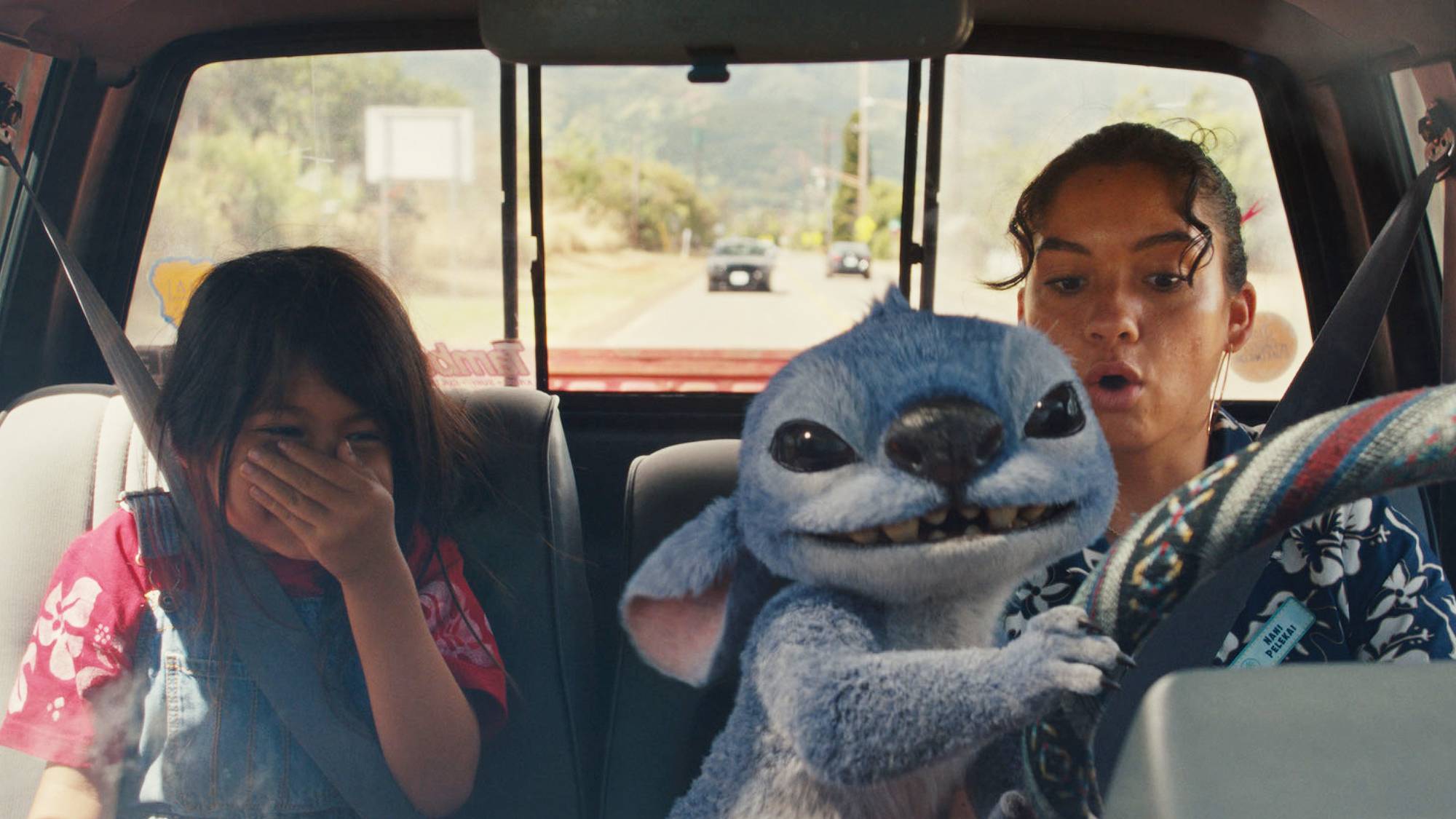 Maia Kealoha as Lilo, Stitch and Sydney Agudong as Nani in Disney’s live-action "Lilo & Stitch" movie (2025)
