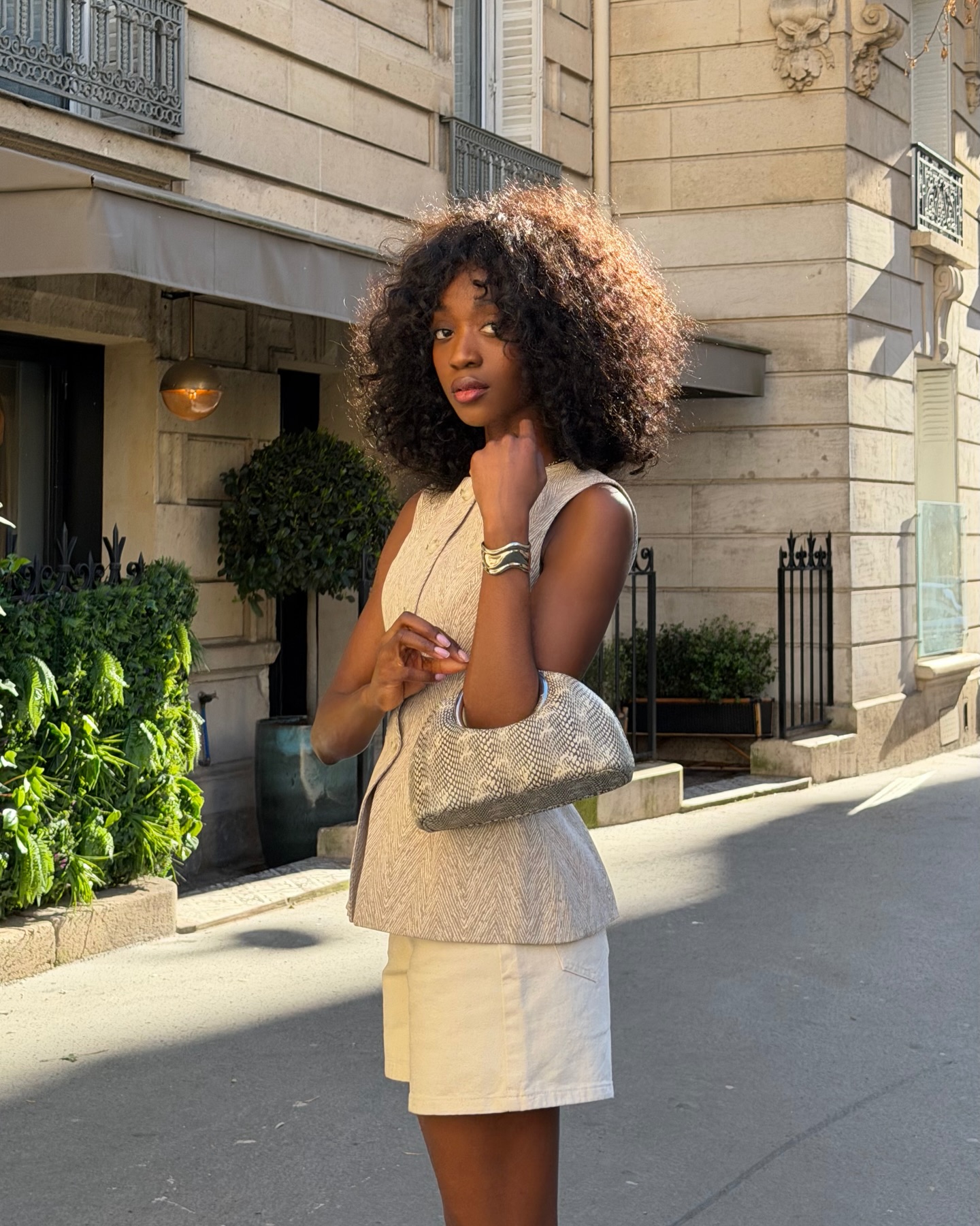 Emmanuelle Koffi in a By Malena linen vest