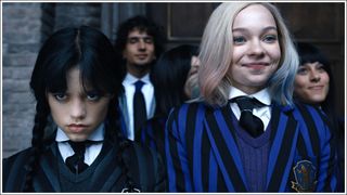 Jenna Ortega as Wednesday Addams next to Emma Meyers as Enid in Wednesday season one on Netflix