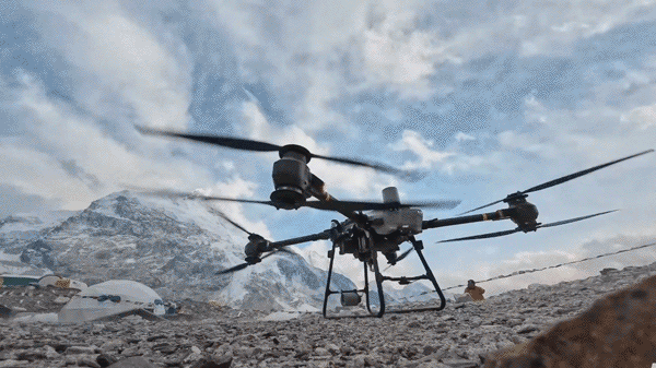 DJI Drone takes off to do a delivery on Mount Everest as seen from under the drone