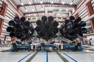 The 27 engines of SpaceX's Falcon Heavy rocket are front and center during assembly in this photo tweeted by Elon Musk on Dec. 20, 2017.