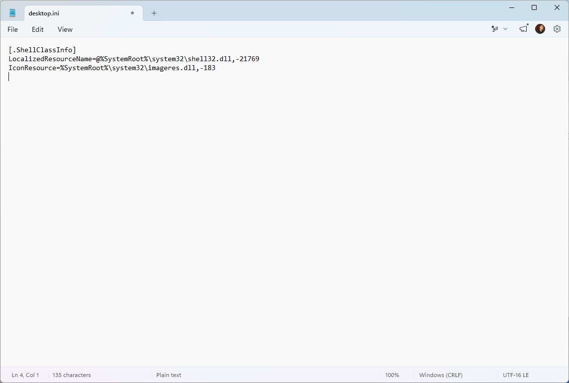 Notepad showing the content of the desktop.ini file.
