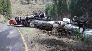 A tanker truck full of young spring Chinook salmon overturned in Oregon, but many of the fish managed to escape into a nearby creek.