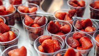 Strawberries in plastic cups