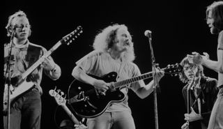 (from left) Stephen Stills, David Crosby, Neil Young and Graham Nash perform at Wembley Stadium in London in 1974