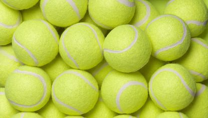A group of yellow tennis balls