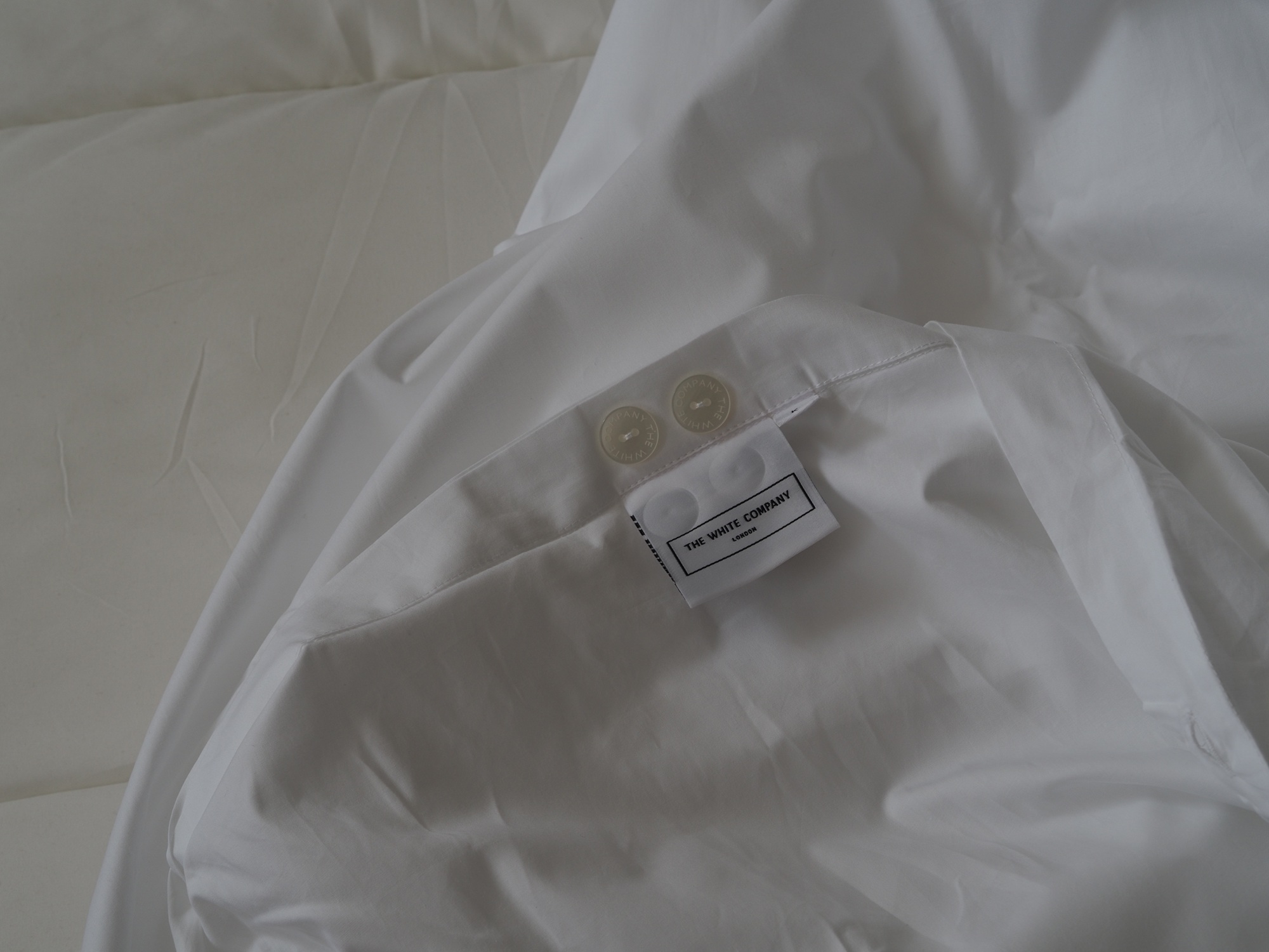 inside of white company bedding on a bed
