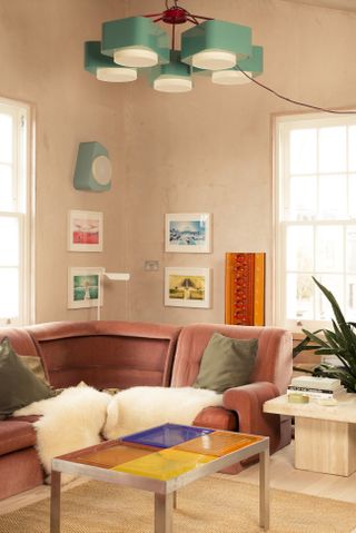 A living room drenched in pastel tones