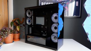 Arctic's Xtender PC case on a white desk with various parts being installed to build a functional gaming PC.