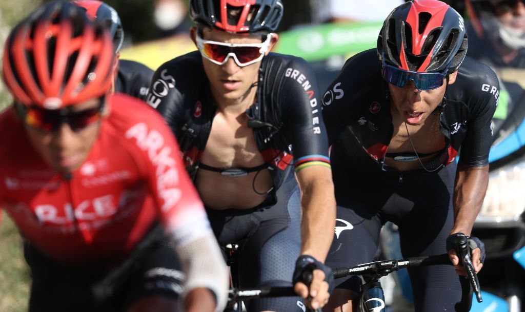 Team Ineos rider Colombias Egan Bernal R climbs the Grand Colombier pass behind the leaders group during the 15th stage of the 107th edition of the Tour de France cycling race 175 km between Lyon and Grand Colombier on September 13 2020 Photo by KENZO TRIBOUILLARD AFP Photo by KENZO TRIBOUILLARDAFP via Getty Images