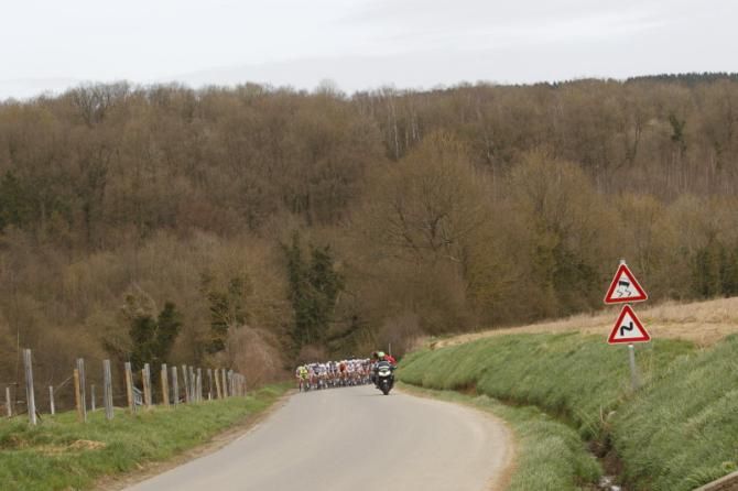 The landscape dwarfs the peloton