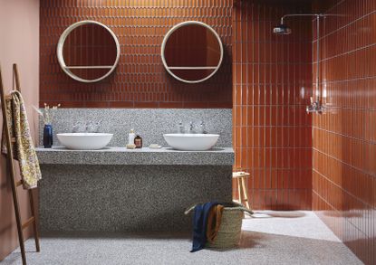Burnt orange tiles, two different shapes, grey sink tiles