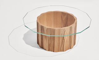 Round wooden table with glass top