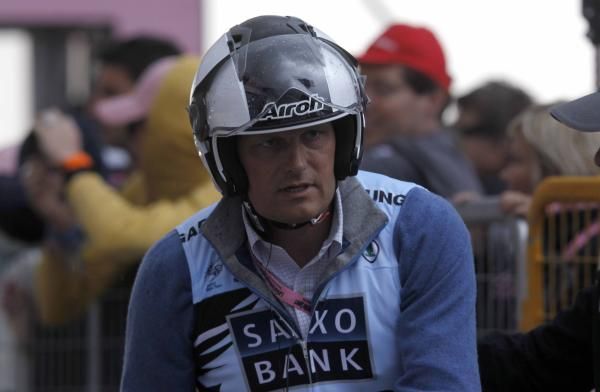Hands on management: Bjarne Riis hopped on the motorbike to stay close to Alberto Contador on the Zoncolan.