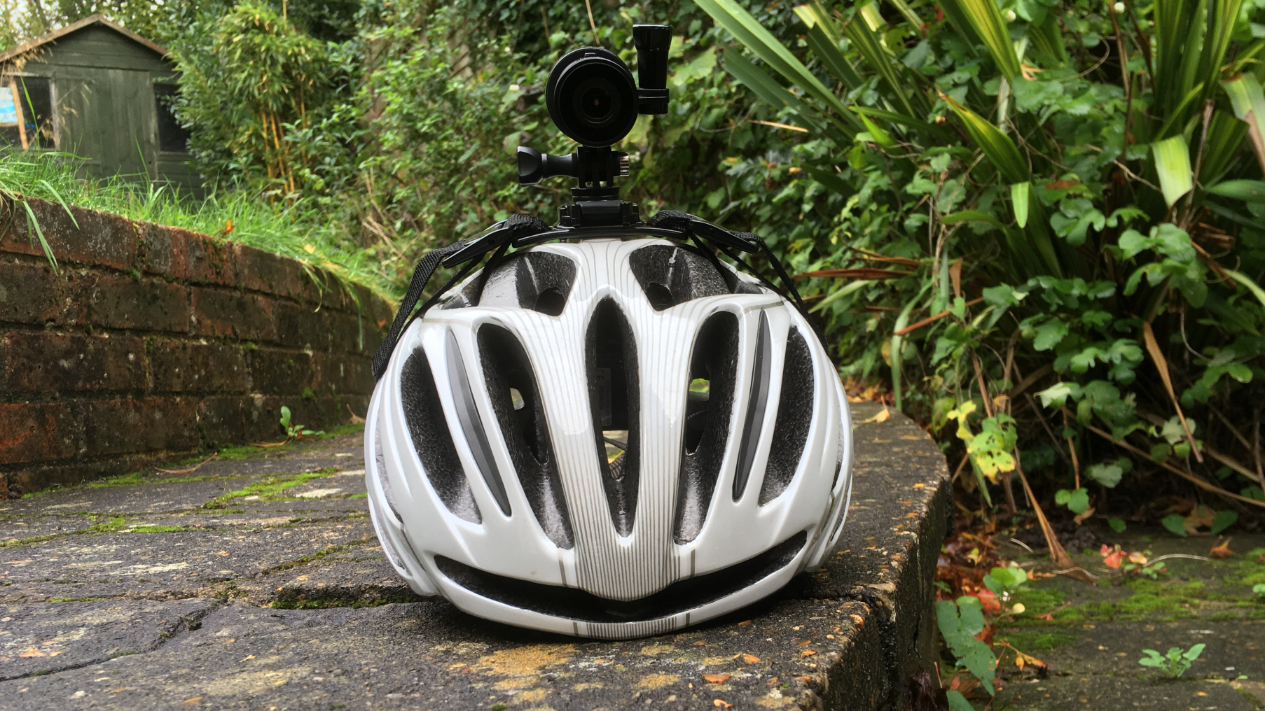 Image shows the Techalogic DC-1 mounted on a bike helmet