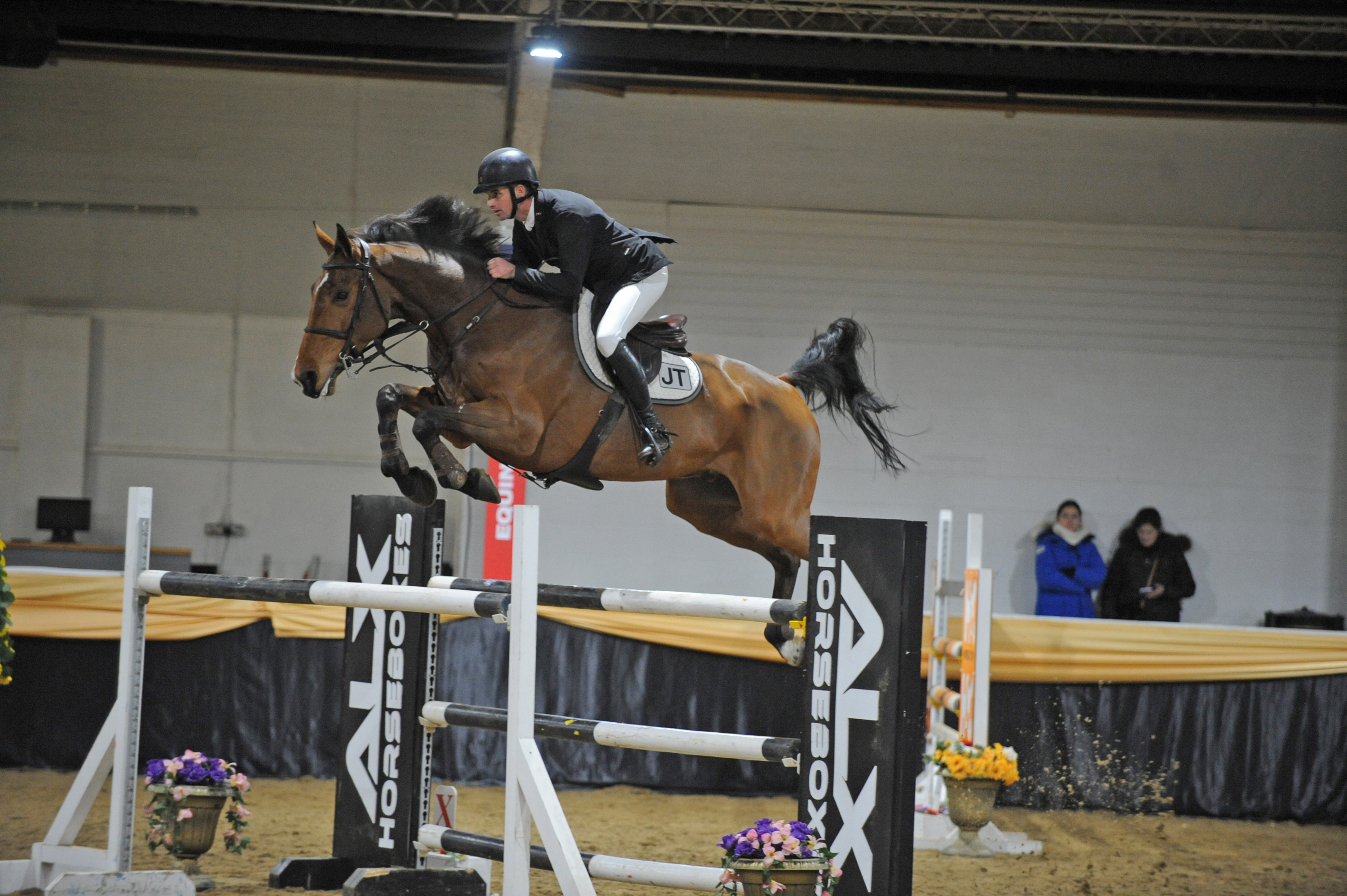 Joe Trunkfield and Grennanstown Sarco Lux Hill winning the Arena UK grand prix