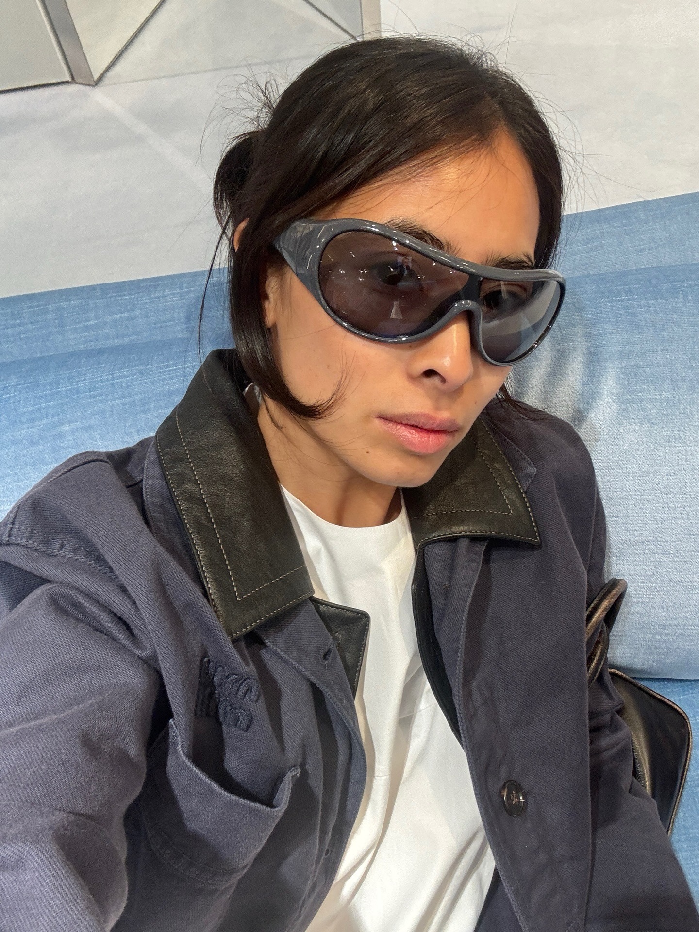 influencer wearing wraparound sunglasses