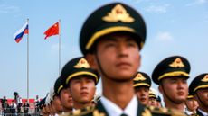 Chinese soldiers stand during a welcome ceremony for Russian President Vladimir Putin in Tianjin.