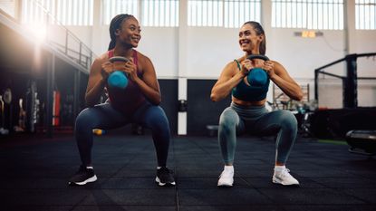 What is functional strength training? Two women working out in the gym