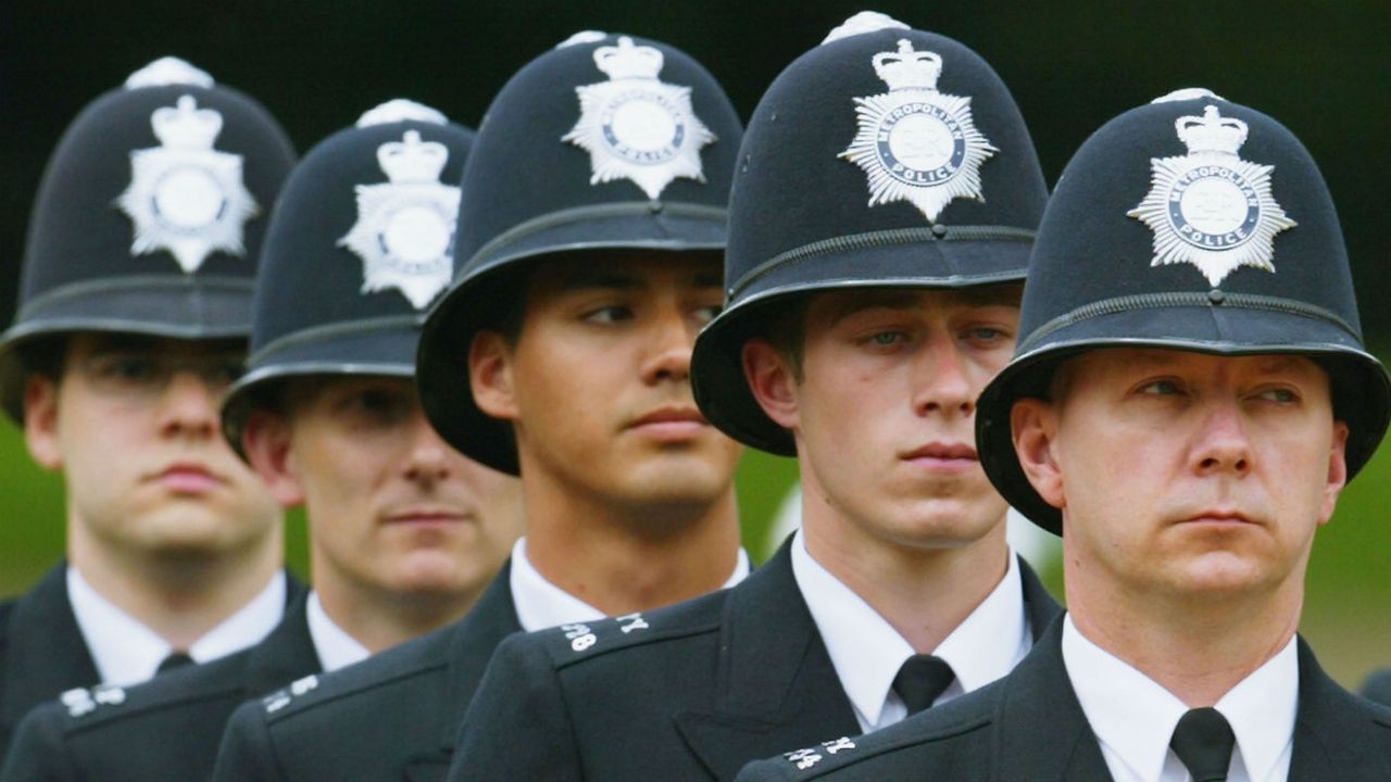 Officers stand to attention during the Metropoitan Police Service&amp;#039;s 175th Anniversary