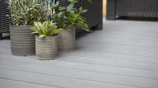 decking painted grey with planters
