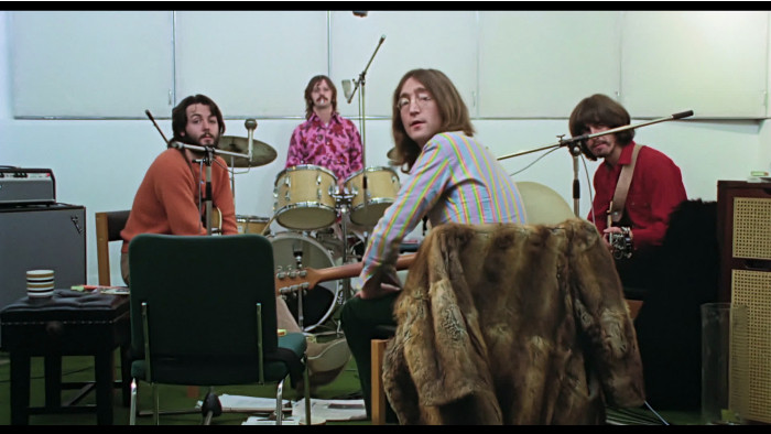 The Beatles in a recording studio