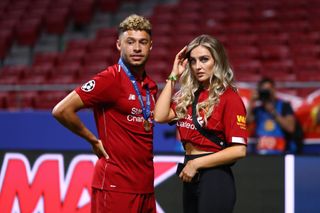 Alex Oxlade-Chamberlain and Perrie Edwards after Liverpool's 2019 Champions League final win