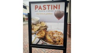 Pastini street ad with the fly edited out