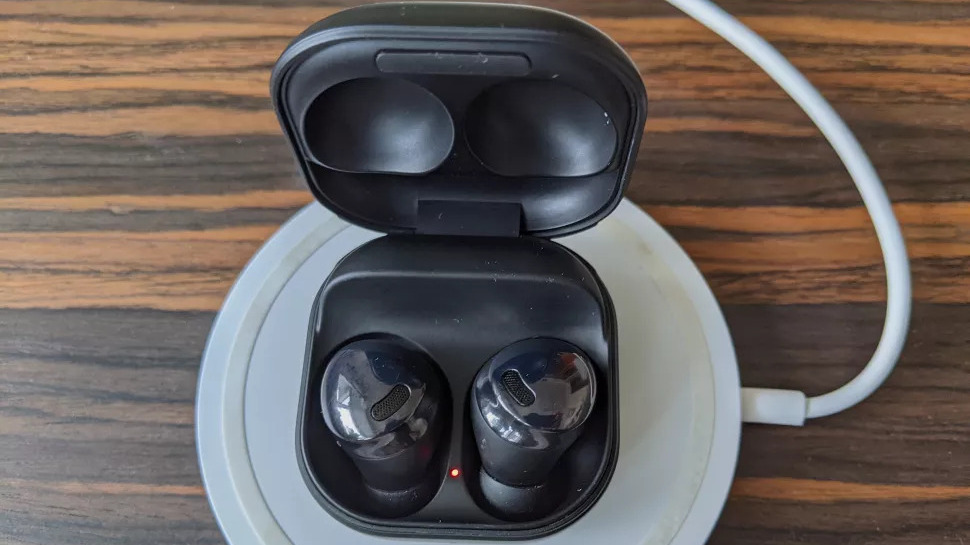The Samsung Galaxy Buds Pro charging wirelessly