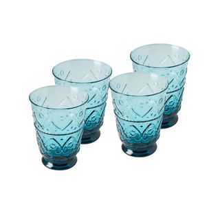 A set of blue tinted ornate juice glasses