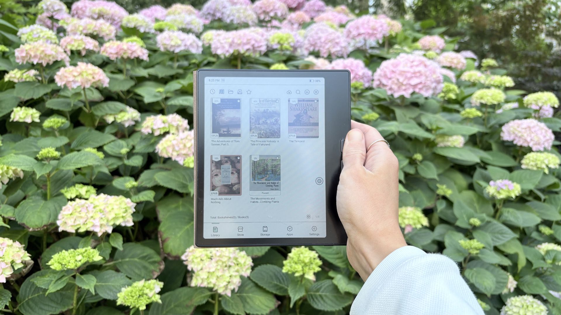 BOOX Go Colour Gen 2 eReader being used outside, in the daylight