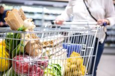 Full shopping trolley in supermarket