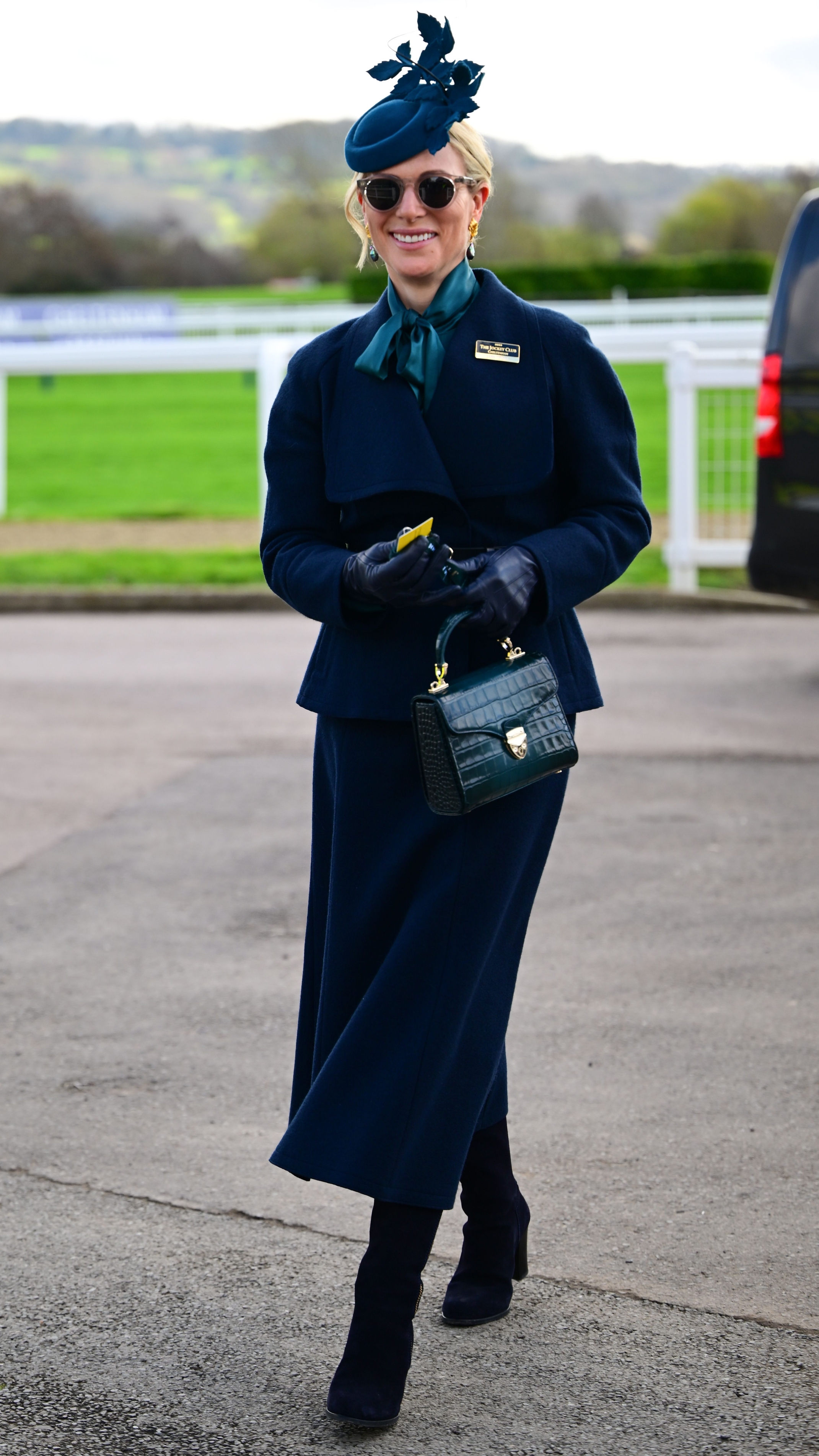 Zara Tindall smiles as she arrives on Day 1 of Cheltenham 2026