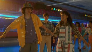 Mike, Will and Eleven skating in Stranger Things Season 4