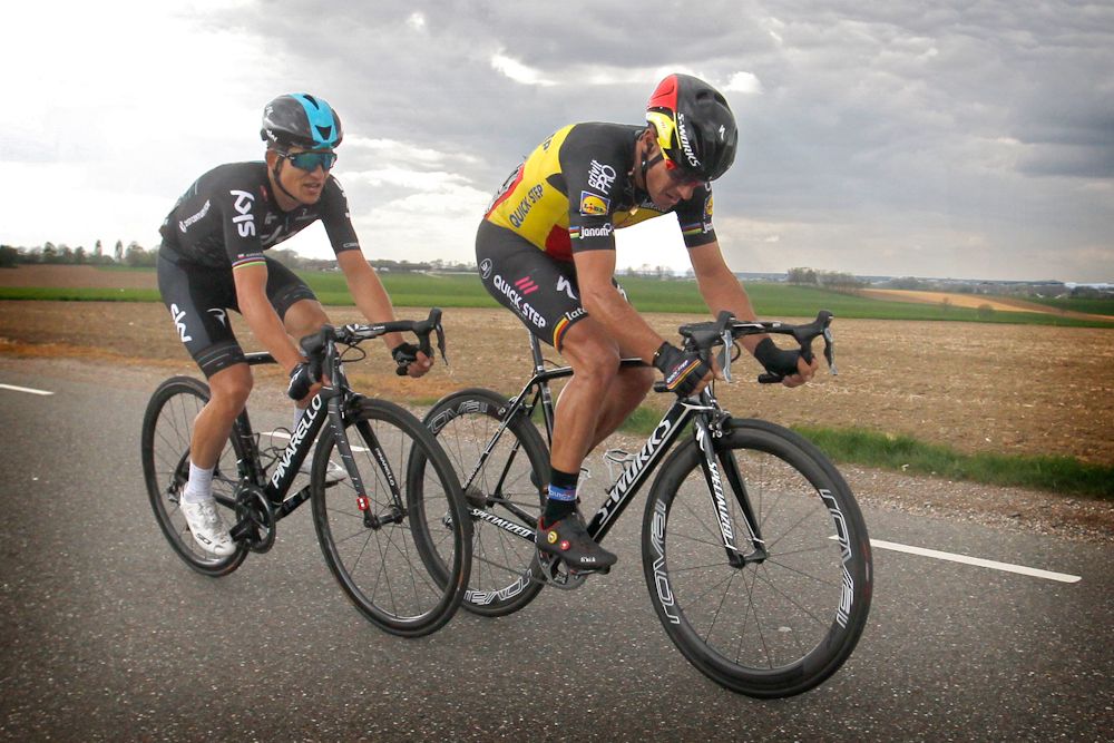 Philippe Gilbert and Michal Kwiatkowski ride toward the finish of the Amstel Gold Race