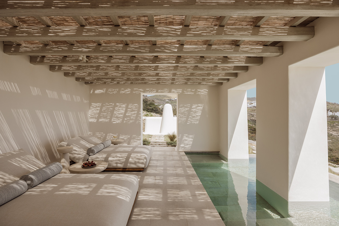 Anamesa by K-Studio, contemporary Greek House within white and minimalist yet sleek forms and inside outside living arrangements