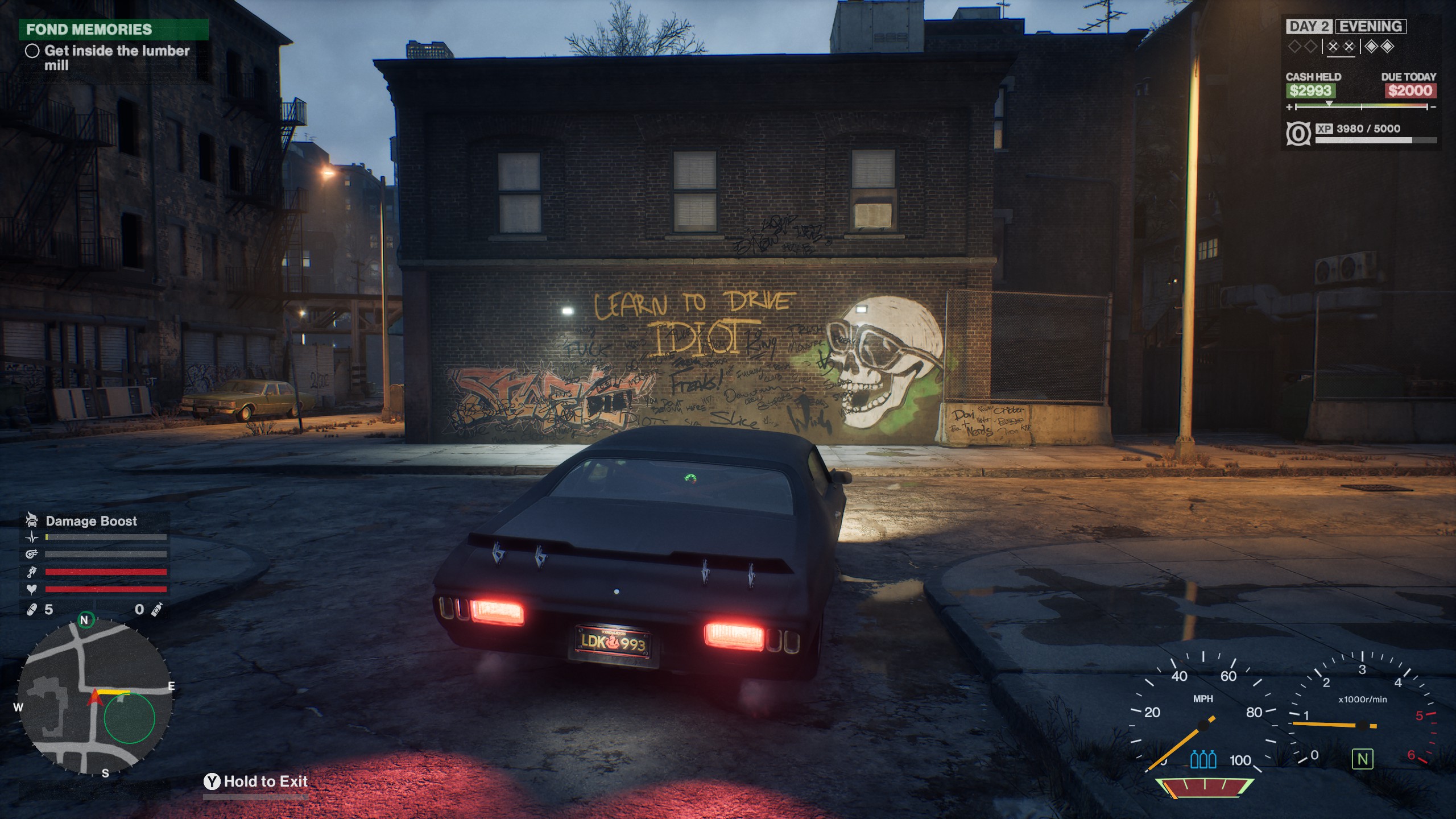 Samson gameplay showing a car driving towards graffiti that says "learn to drive IDIOT"