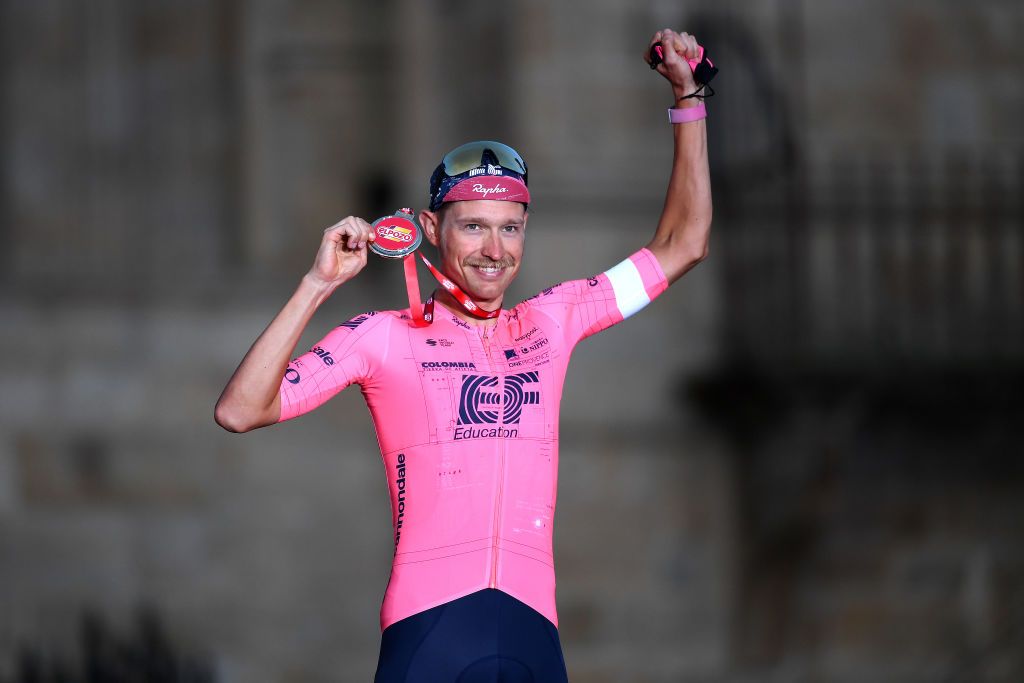 SANTIAGO DE COMPOSTELA SPAIN SEPTEMBER 05 Magnus Cort Nielsen of Denmark and Team EF Education Nippo celebrates winning the most combative trophy on the podium ceremony after the 76th Tour of Spain 2021 Stage 21 a 338 km Individual Time Trial stage from Padrn to Santiago de Compostela lavuelta LaVuelta21 ITT on September 05 2021 in Santiago de Compostela Spain Photo by Tim de WaeleGetty Images