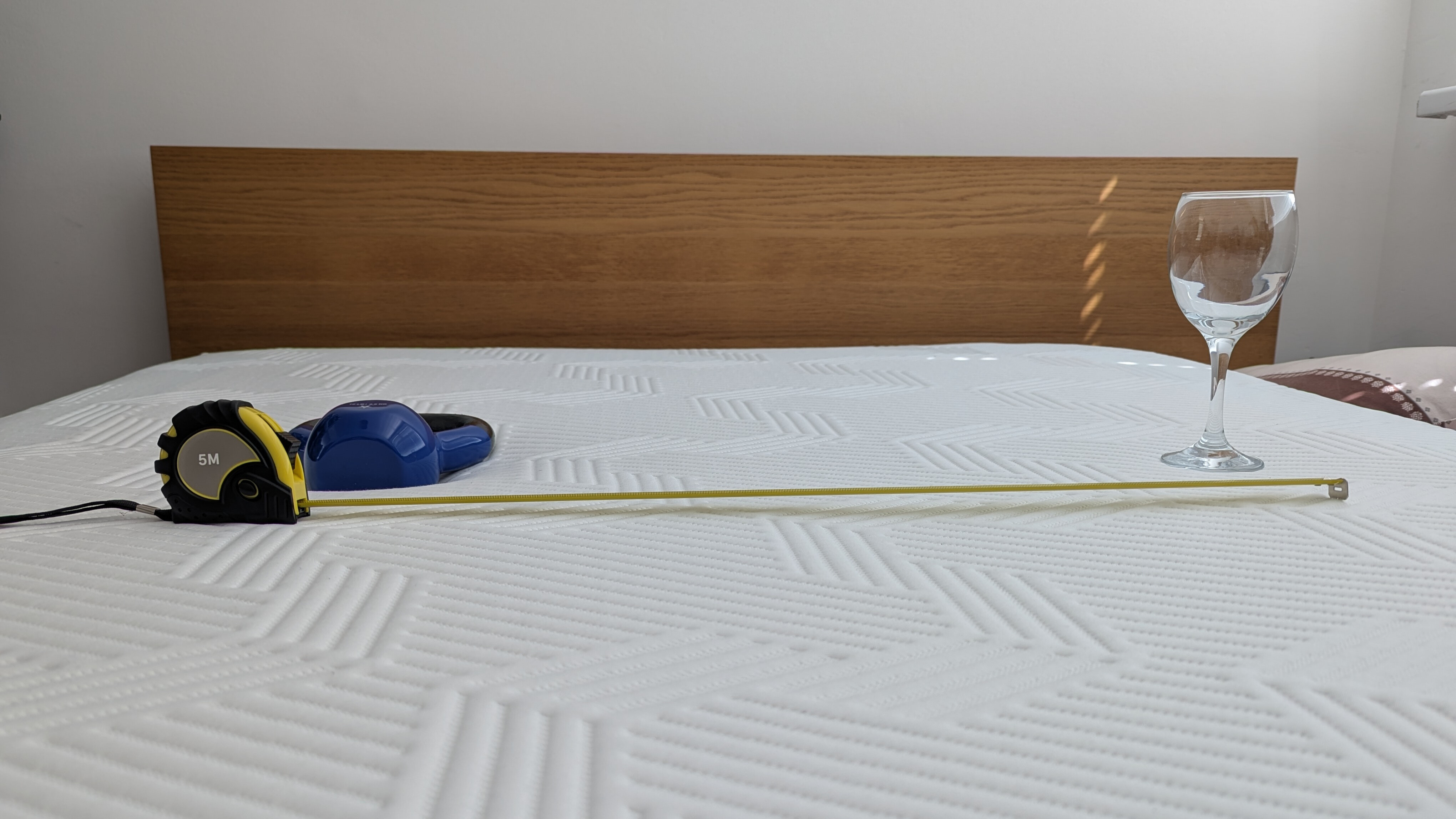 The wine glass and weight drop test to assess motion isolation ability of the Emma Hybrid Airgrid mattress