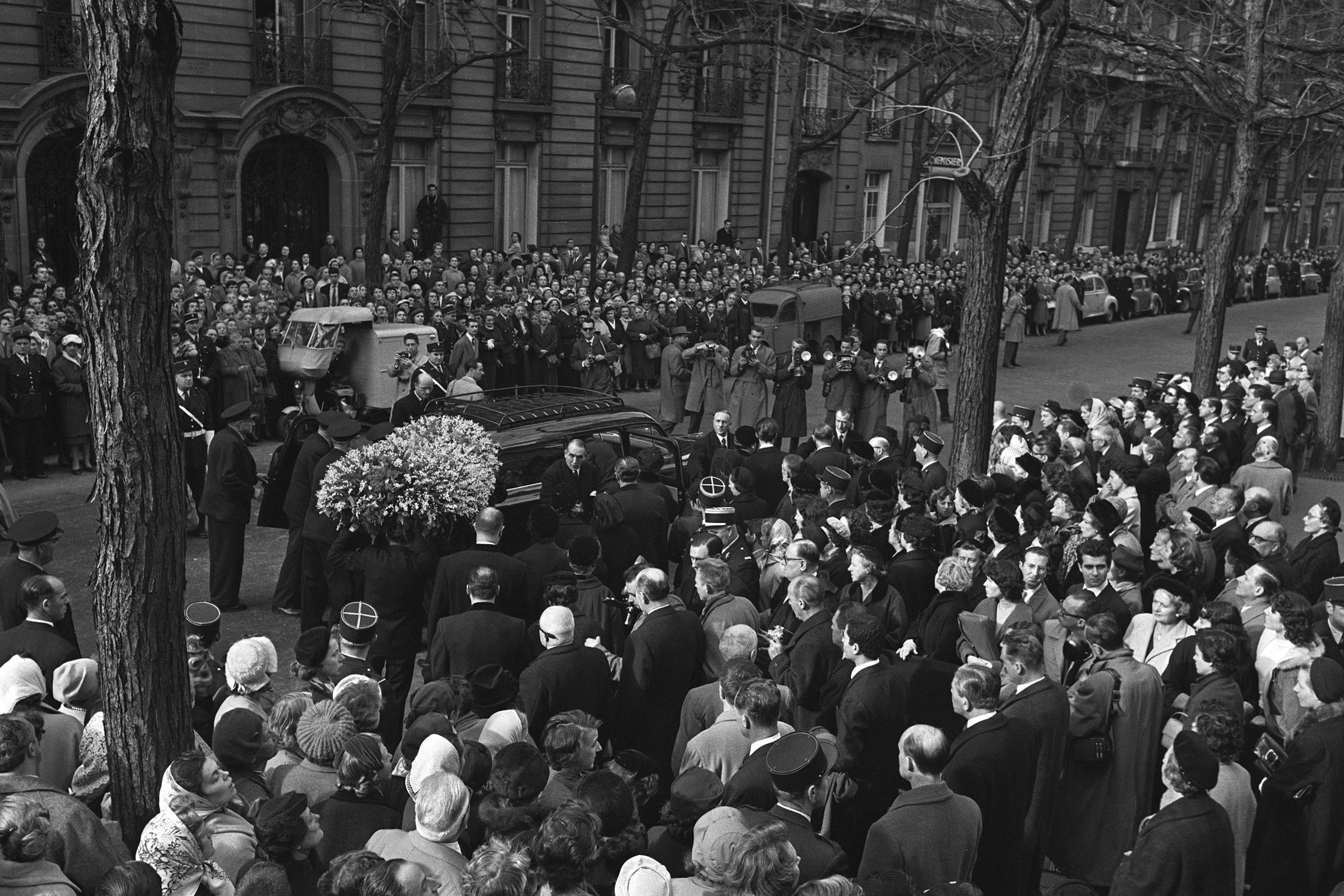 Dior's coffin at the funeral of Christian Dior