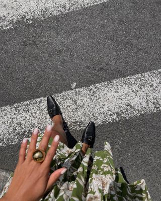 woman wearing black loafers