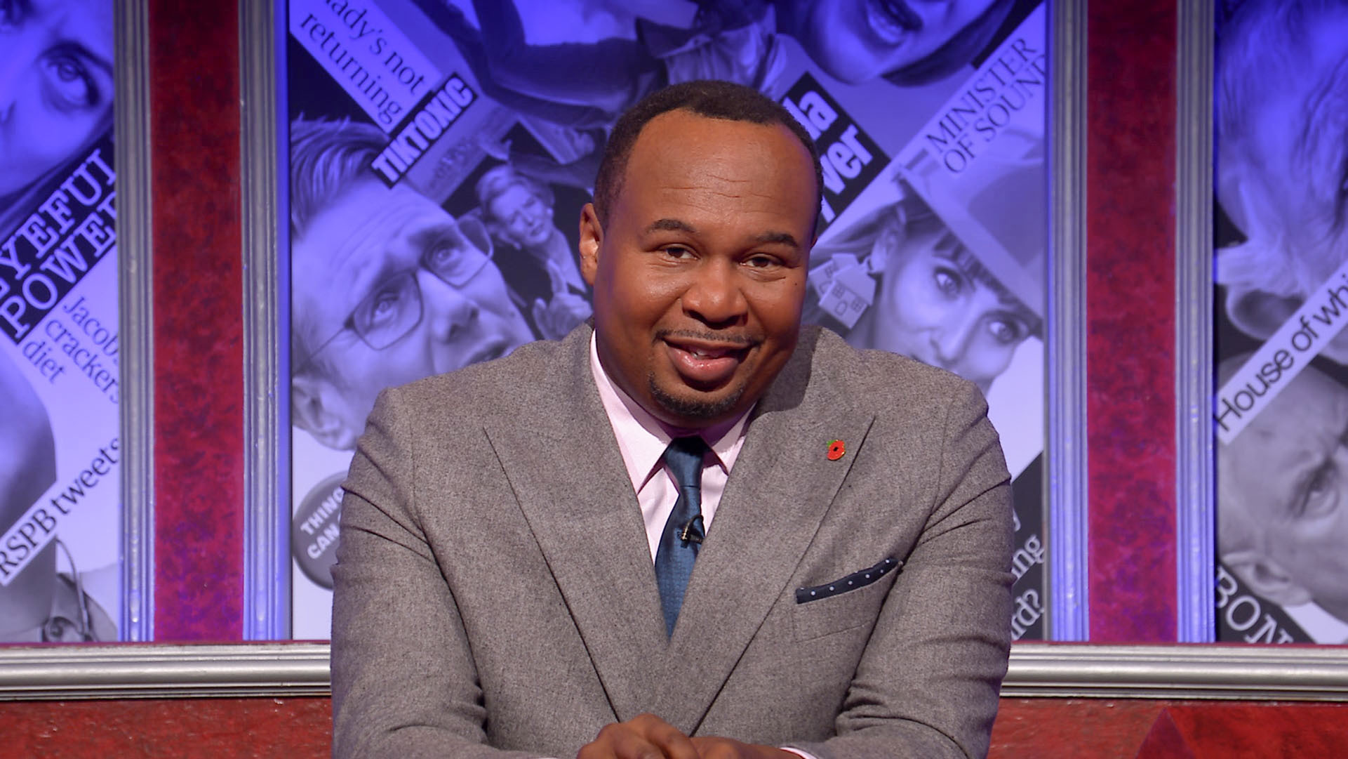 Joy Wood Jr. presenting HIGNFY UK.