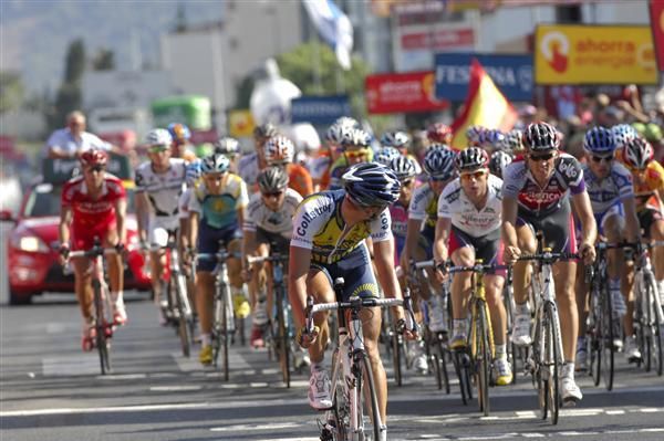 Johnny Hoogerland (Vacansoleil) leads the peloton across the line