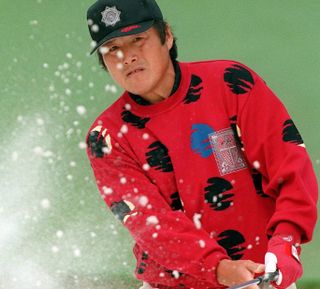 This garish red sweater is just one of many Jumbo Ozaki Masters fashion statements