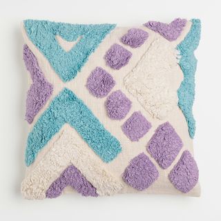 Tufted, patterned throw pillow in lilac, turquoise and beige
