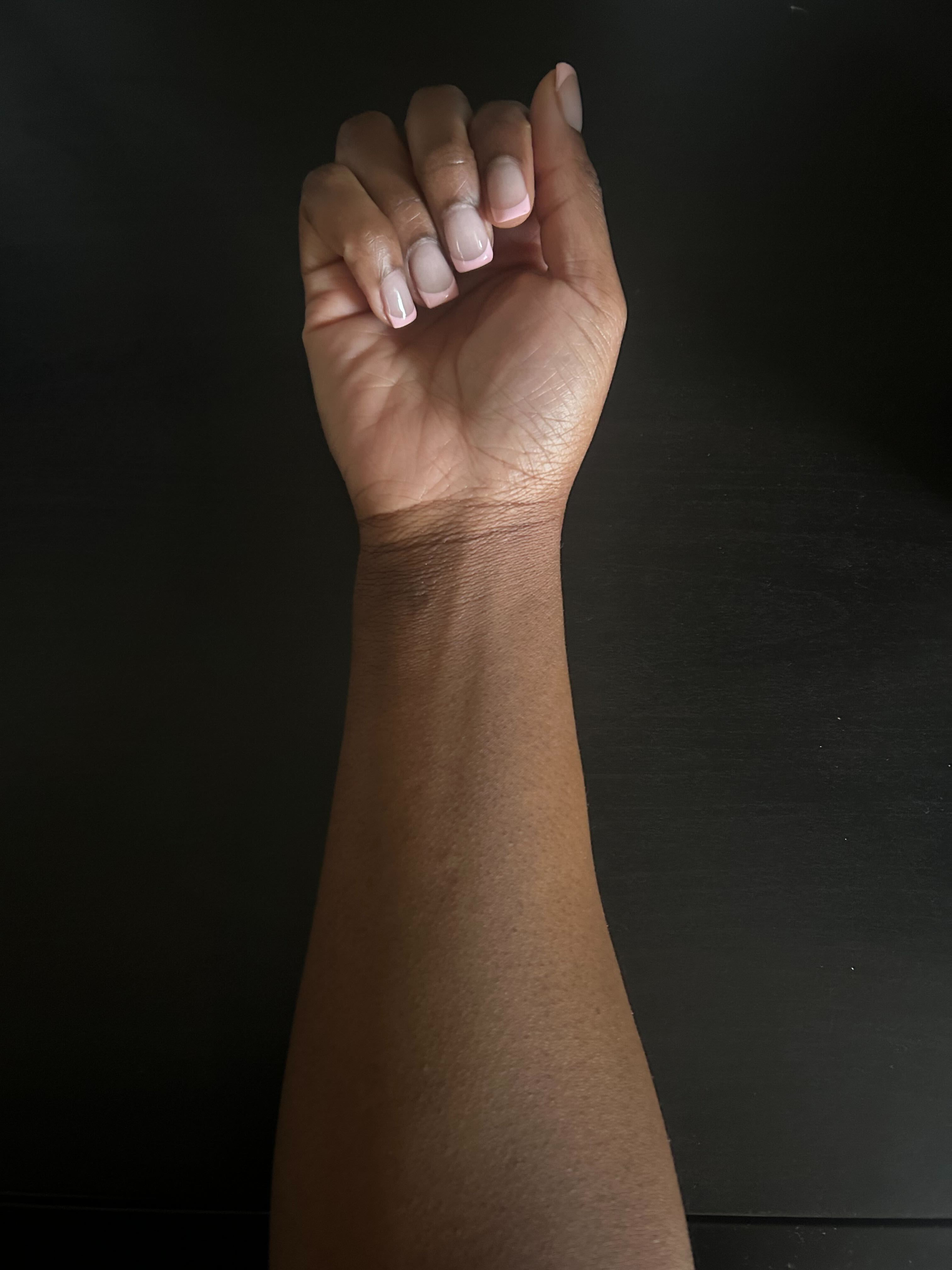 Brittany's arm after testing Bondi Sands tan in Caramel