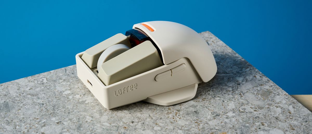 The Lofree Touch mouse on a stone surface