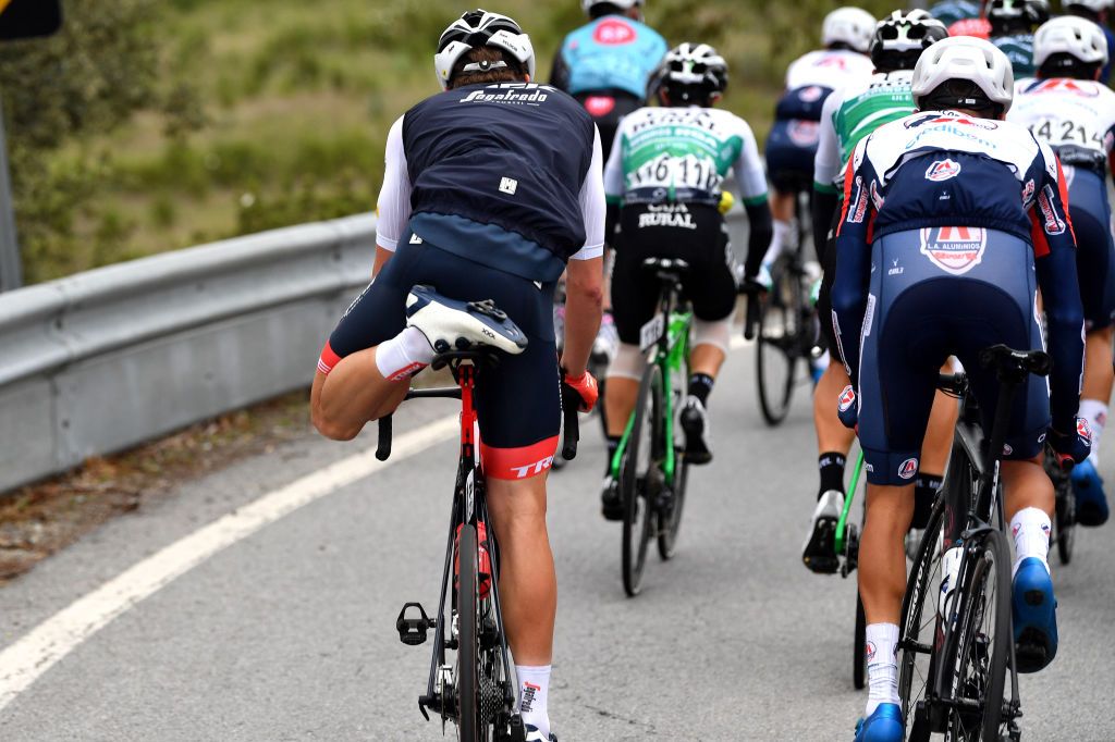 FARO PORTUGAL FEBRUARY 18 Alexander Kamp Egested of Denmark and Team Trek Segafredo stretching during the 48th Volta Ao Algarve 2022 Stage 3 a 2114km stage from Almodvar to Faro VAlgarve2022 on February 18 2022 in Faro Portugal Photo by Luc ClaessenGetty Images