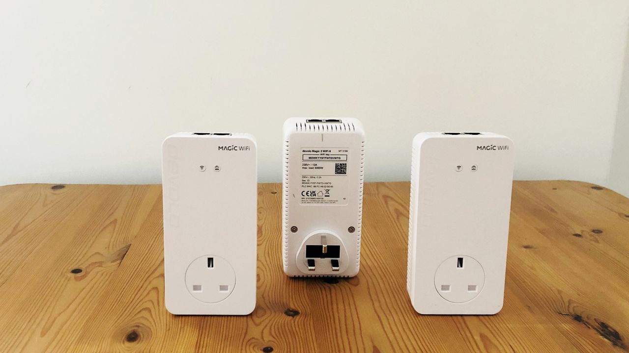 Devolo Magic 2 Wi-Fi 6 Mesh on a wooden desk