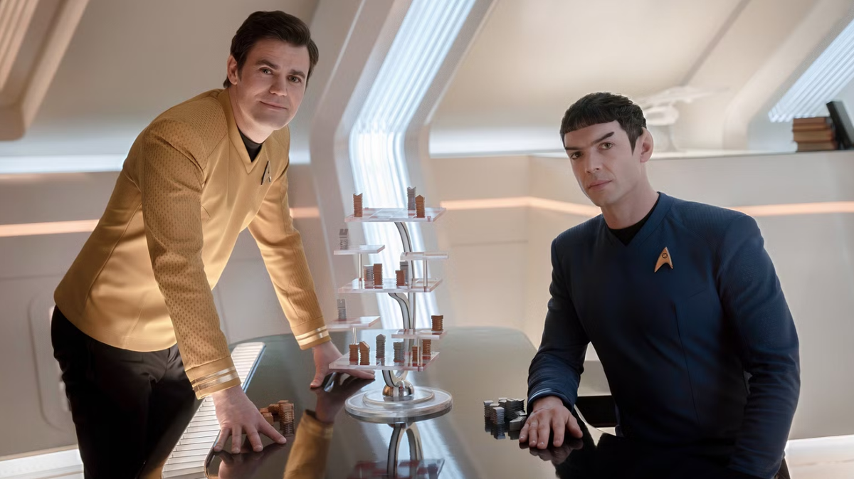 two male officers aboard a TV show starship